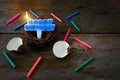 Eggshell With Nest and Candle for Happy Birthday Conce Royalty Free Stock Photo
