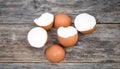 Eggshell placed on a wooden plate Royalty Free Stock Photo