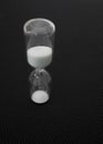 Eggtimer, timer, time running out, on black fabric Royalty Free Stock Photo