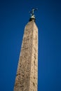 Egiptian column in piazza del popolo in rome italy