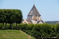 Eglise Saint Etienne church in the town of Villandy, taken from the ornamental garden at Chateau de Villandry in the Loire, France Royalty Free Stock Photo