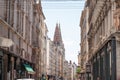 Eglise Saint Nizier Church on Rue Paul Chenavard Street in Lyon, France, with Haussmann style buildings and some commercial shops