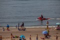 Egmond aan Zee, Netherlands - July 18, 2019: a member of the dutch coastguard on a jet ski in the north sea close to the beach Royalty Free Stock Photo