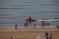 Egmond aan Zee, Netherlands - July 18, 2019: a member of the dutch coastguard on a jet ski in the north sea close to the beach Royalty Free Stock Photo