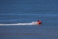 Members of the dutch coastguard `Reddingsbrigade` on a jet ski during a lifesaving drill Royalty Free Stock Photo