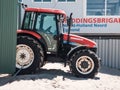 Egmond aan Zee, Netherlands - July 21, 2019: a tractor of the dutch coastguard on the beach in front of the coastguard station