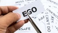 Ego ego ntext or word meaning on paper in hand holding. Royalty Free Stock Photo