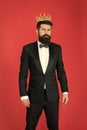 Egoist. Businessman in tailored tuxedo and crown. Bearded man egoist in tuxedo and bow tie. Big boss. Formal event. King