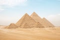 Egypt. Cairo - Giza. General view of pyramids from the Giza Plateau. three pyramids known as Queens\' Pyramids, in background: the Royalty Free Stock Photo