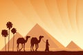 Egypt Great Pyramids with Camel caravan on sunset background