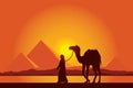 Egypt Great Pyramids with Camel caravan on sunset background