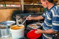 Local chef man cooking preparing shrimps