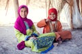 Egypt, Hurghada, 12 may 2019, two girls sitting on the ground in the beduin village