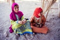 Egypt, Hurghada, 12 may 2019, two little girls sitting on the ground in the beduin village