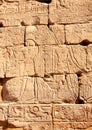 EGYPT, LUXOR - MARCH 01, 2019: ancient Egyptian hieroglyphs, drawings and inscriptions on the walls and columns in the temple of