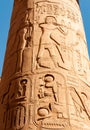 EGYPT, LUXOR - MARCH 01, 2019: ancient Egyptian hieroglyphs, drawings and inscriptions on the walls and columns in the temple of