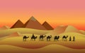 Egypt pyramids. Camels in Egyptian desert. Caravan silhouette in sunset or sunrise scenery. Bedouins travel in sands of Royalty Free Stock Photo