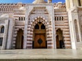 Entrance to the Al Mustafa Mosque in Sharm El Sheikh, front view. Facade of a striped Royalty Free Stock Photo