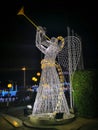 Luminous sculpture of a Christmas Angel With A Trumpet on Soho Street in Sharm El