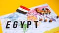 Egypt travel concept, camel magnet, egypt flag over world map