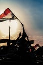 Egyptian Activist with Egyptian Flag Against Sunset Royalty Free Stock Photo