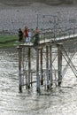 Egyptian boys stand on a water pumping jetty.