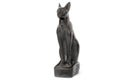 Egyptian figurine. Egyptian culture and heritage. Egyptian cat Royalty Free Stock Photo