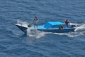 Egyptian fishermen fishing from a boat in the Red Sea