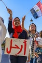 Egyptian Girl Protesting with LEAVE Sign Royalty Free Stock Photo