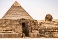 Egyptian Great Sphinx full body portrait head,with pyramids of Giza background Egypt empty with nobody. copy space Royalty Free Stock Photo