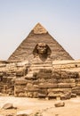 Egyptian Great Sphinx full body portrait head,with pyramids of Giza background Egypt empty with nobody. copy space Royalty Free Stock Photo