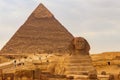 Egyptian Great Sphinx and pyramids of Giza in Cairo, Egypt Royalty Free Stock Photo