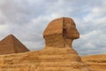 Egyptian Great Sphinx and pyramids of Giza in Cairo, Egypt Royalty Free Stock Photo