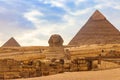 Egyptian Great Sphinx and pyramids of Giza in Cairo, Egypt Royalty Free Stock Photo