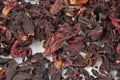 Egyptian hibiscus dry red tea (karkade) background Royalty Free Stock Photo