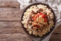 Egyptian kushari of rice, pasta, chickpeas and lentils horizontal top view