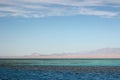 Egyptian landscape. Blue sky and tricolor sea.