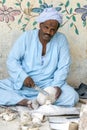 An Egyptian man shaping a bowl from a piece of marble at a factory in Luxor in central Egypt.