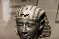 Egyptian Museum of Turin, Italy - September 2021: close-up of an Egyptian head finely carved in black diorite Royalty Free Stock Photo