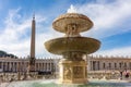 Egyptian obelisk and fountain on St Peter`s square in Vatican, Rome, Italy Royalty Free Stock Photo