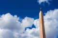 Egyptian obelisk in Rome with clouds