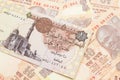 An Egyptian one pound note with Indian ten rupee bank notes Royalty Free Stock Photo