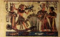 Egyptian papyrus with Ra sun rays with figures and signs. Royalty Free Stock Photo