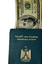 Egyptian passport with American dollars of 100 one hundred United states dollars money banknotes, Arab republic of Egypt's