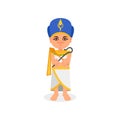 Egyptian pharaoh standing with rod and whip in hands. Ancient Egypt theme. Man in traditional costume and headdress Royalty Free Stock Photo