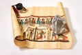 Egyptian scroll, lights and a bag