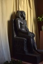 Egyptian sculpture sitting