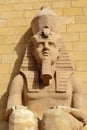 Egyptian sculpture of a sitting man Royalty Free Stock Photo