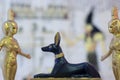Egyptian statuettes anubis eset nebtht in gold Royalty Free Stock Photo