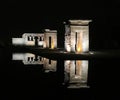 Egyptian temple of Debod at night illuminated with artificial lights and reflected in the water, Madrid, Spain Royalty Free Stock Photo